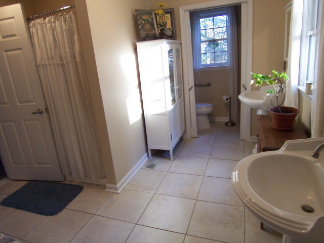69 Lentz Road Macon, GA 31220 - Photo 11 of 12 a bathroom with a sink and toilet