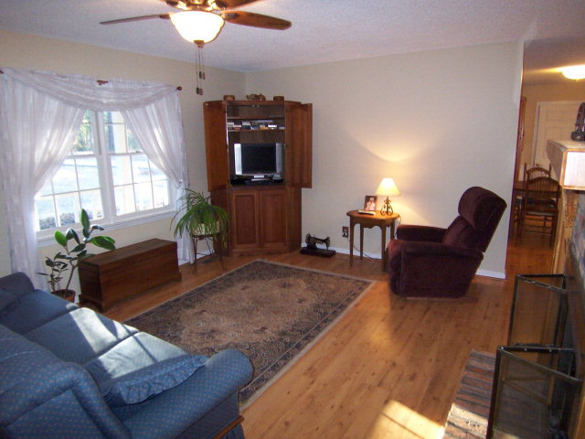 69 Lentz Road Macon, GA 31220 - Photo 7 of 12 a living room with furniture and a flat screen tv