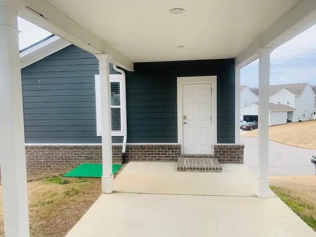 a view of entrance gate of the house