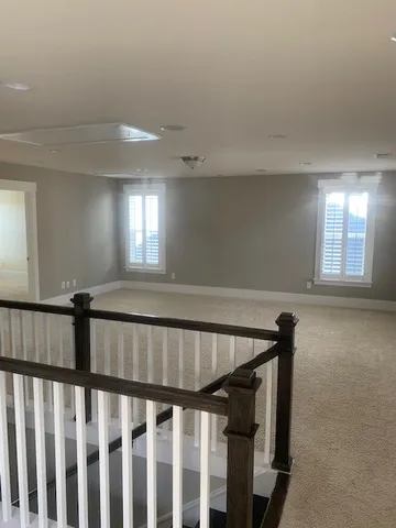 a view of hallway with stairs