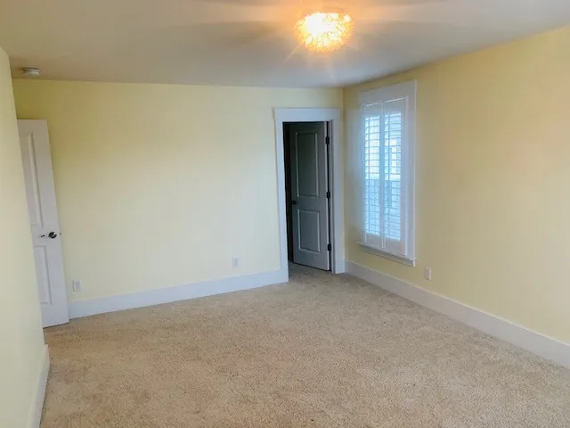 an empty room with window