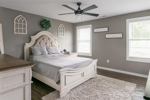 a bathroom with a sink double vanity and a mirror