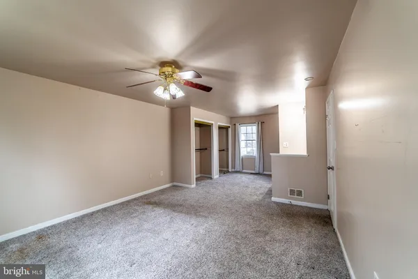 an empty room with windows