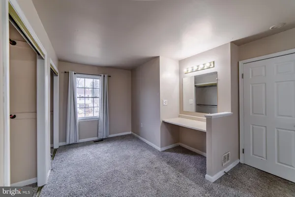 an empty room with windows