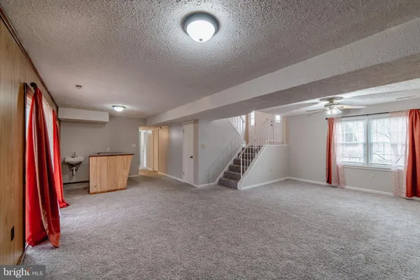 a view of a room with entryway and closet
