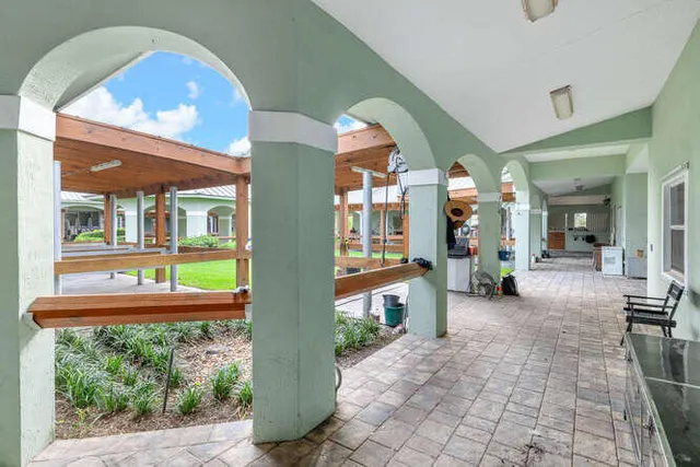 a view of a pool with a yard