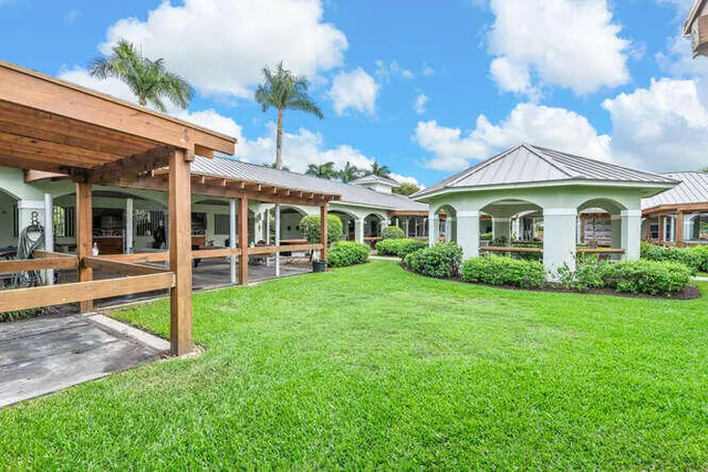 a view of a playground with basketball court
