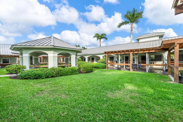 a view of swimming pool with outdoor seating