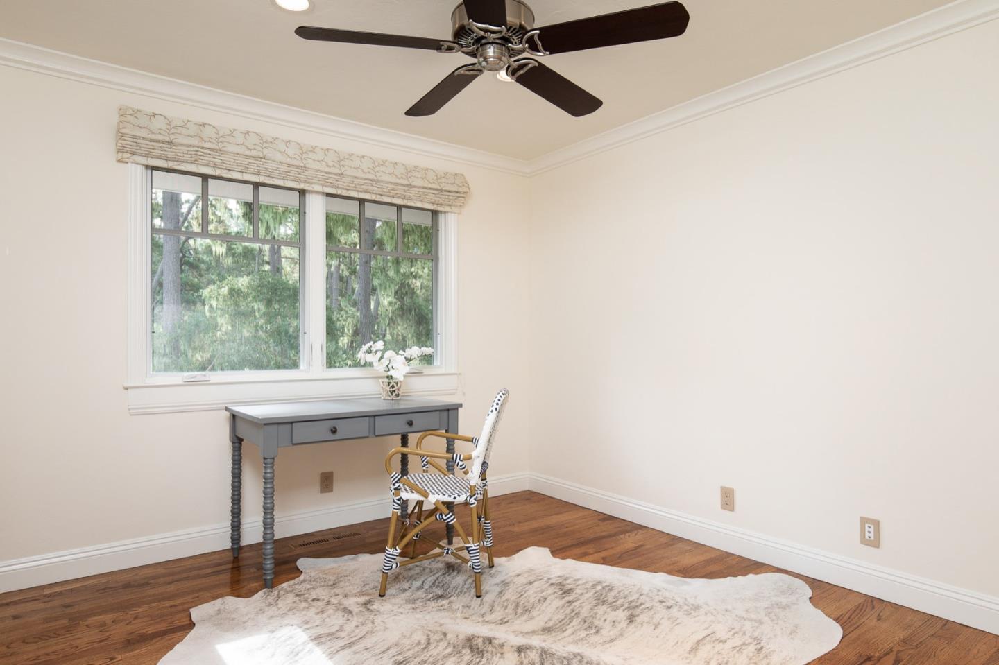 3115 Middle Ranch Road Pebble Beach, CA 93953 - Photo 18 of 19 a workspace with wooden floor and a window