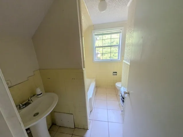 a bathroom with a toilet