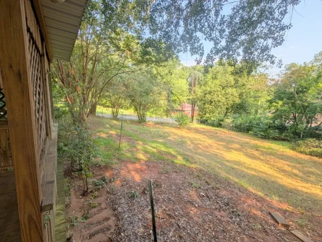 a view of yard with trees