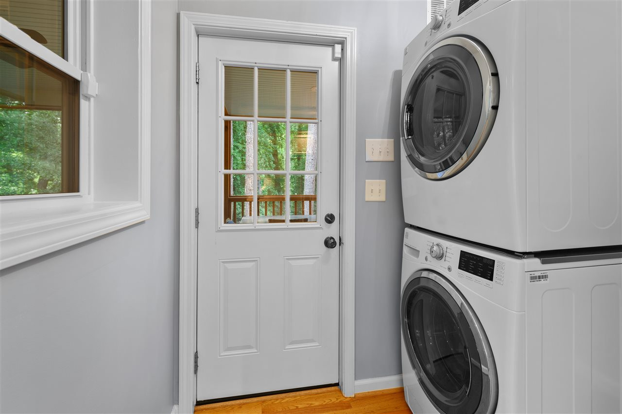 2618 Van Dyke Avenue Raleigh, NC 27607 - Photo 21 of 30 The utility room off of the kitchen and screen porch acts as the perfect laundry room w/ stacked washer and dryer. Laundry