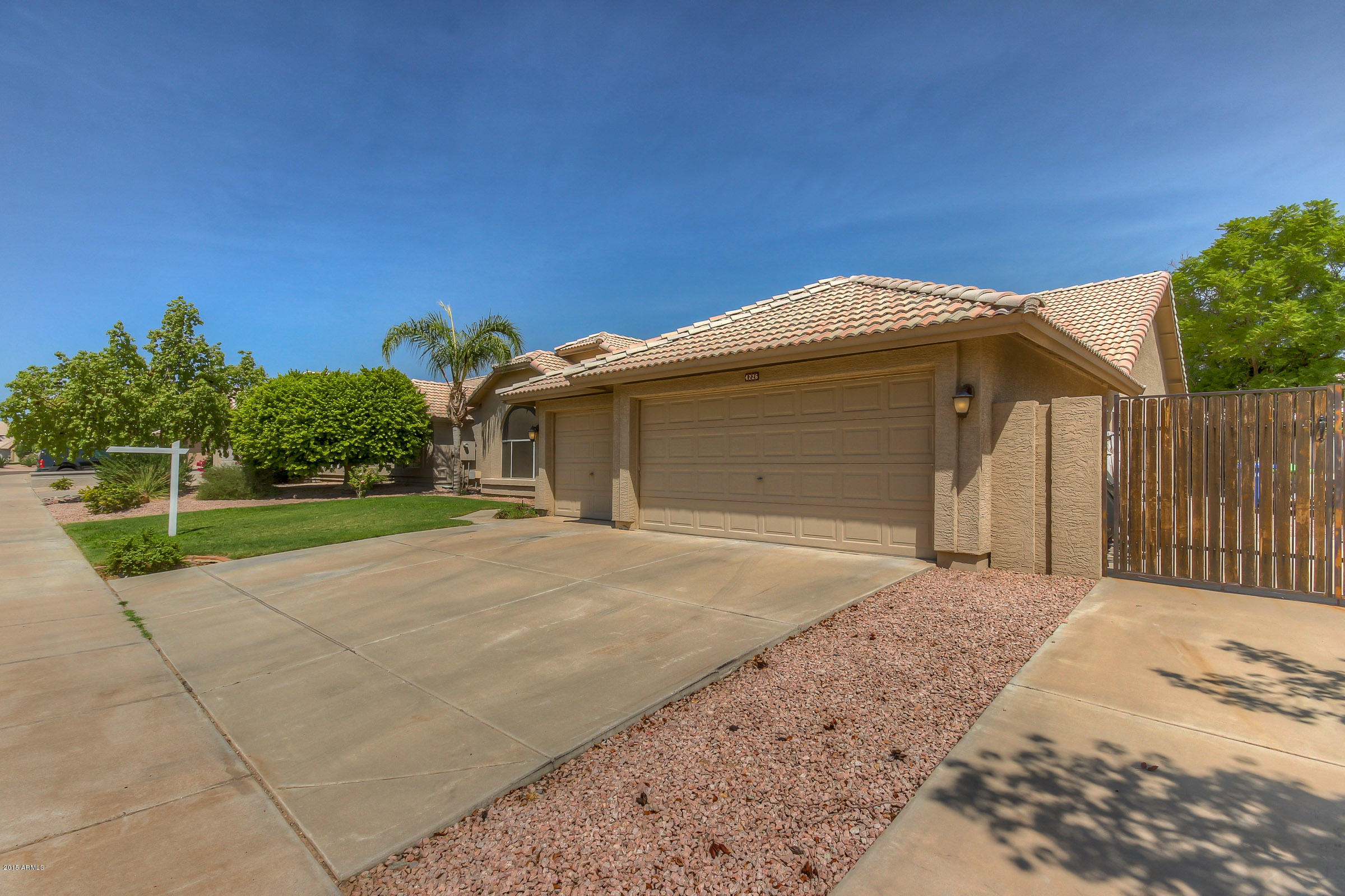 4226 East Rockledge Road Phoenix, AZ 85044 - Photo 3 of 58 Three Car Garage