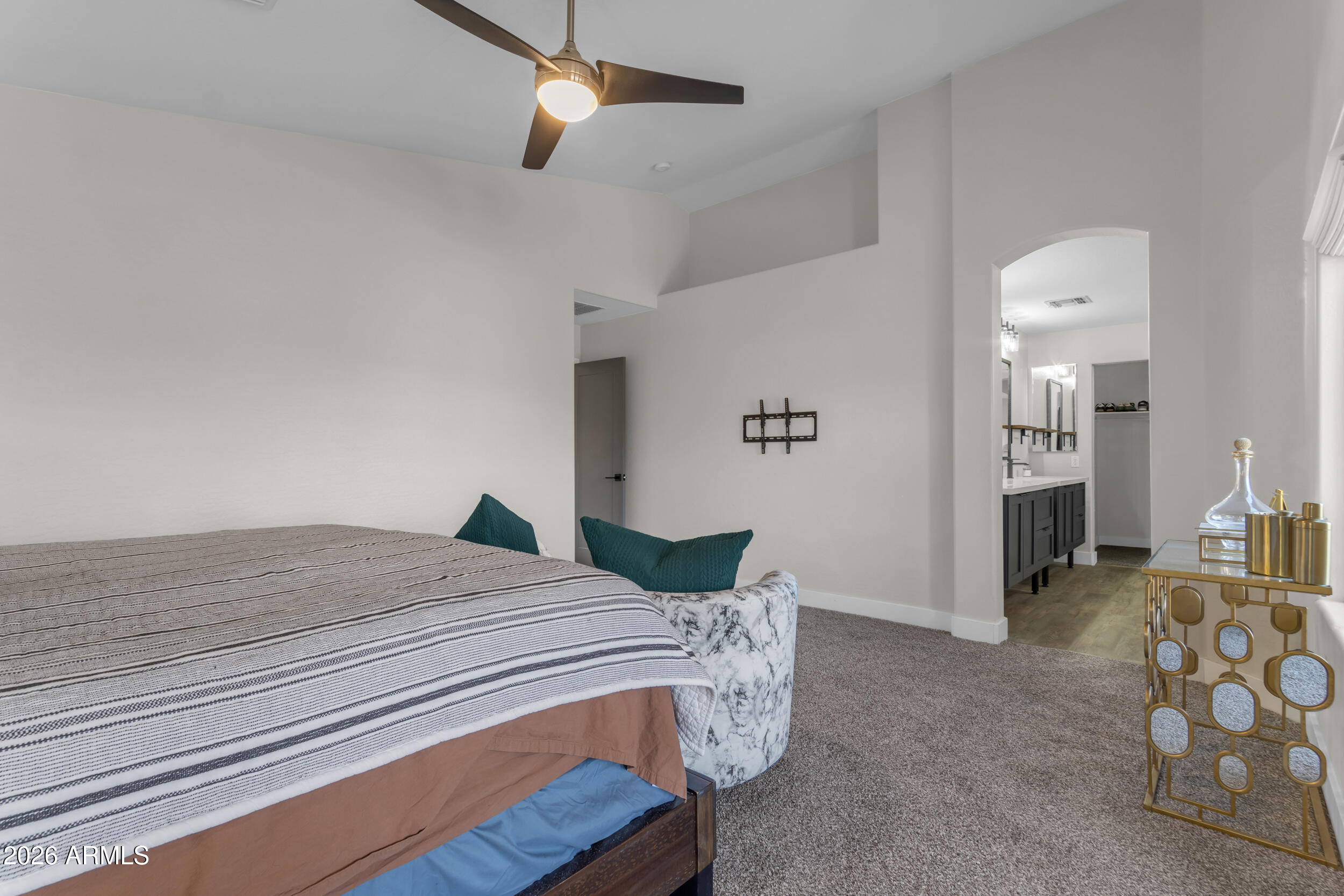 18115 West Cardinal Drive Goodyear, AZ 85338 - Photo 25 of 88 a bedroom with a bed and furniture