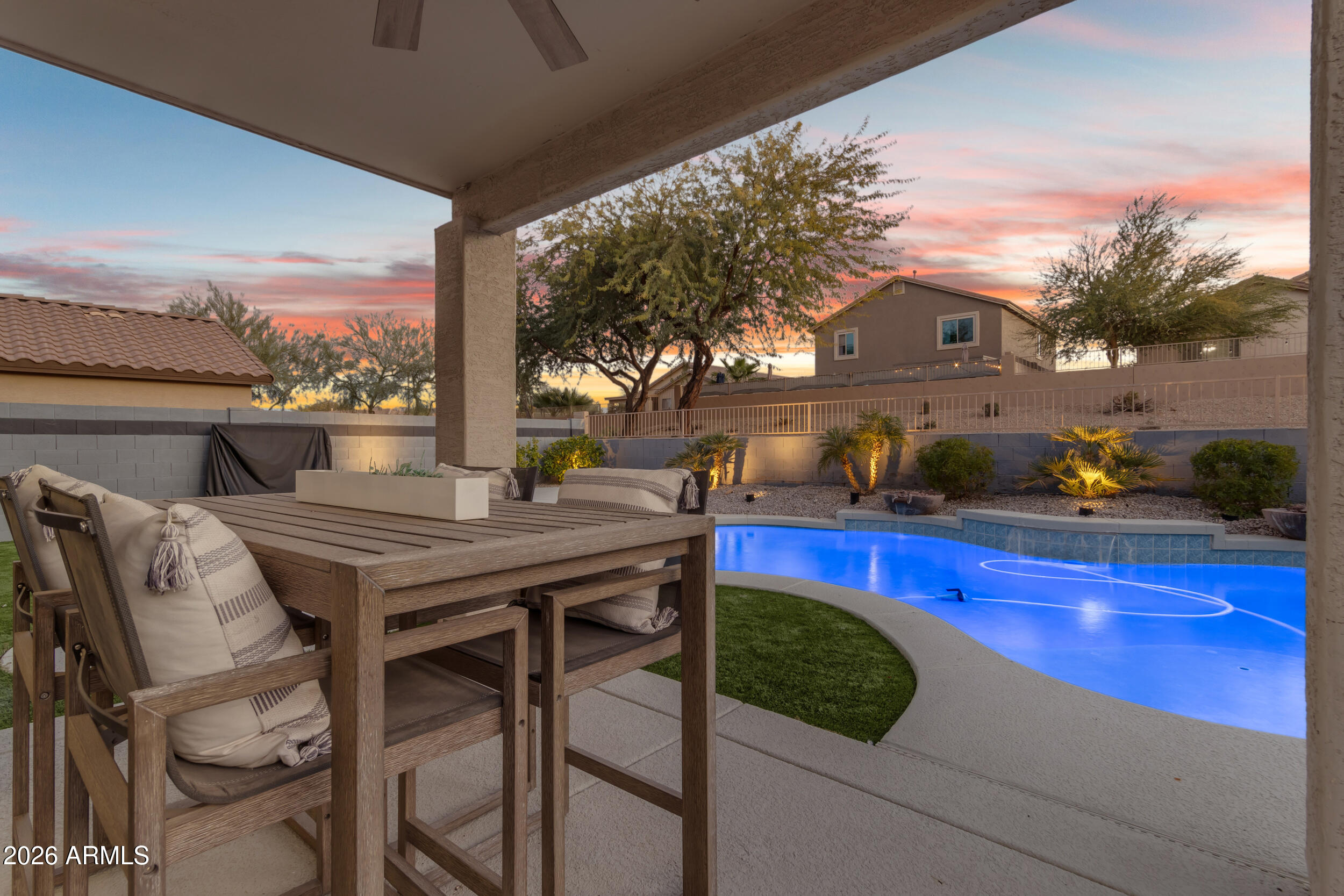 18115 West Cardinal Drive Goodyear, AZ 85338 - Photo 47 of 88 a view of a chairs and table in patio