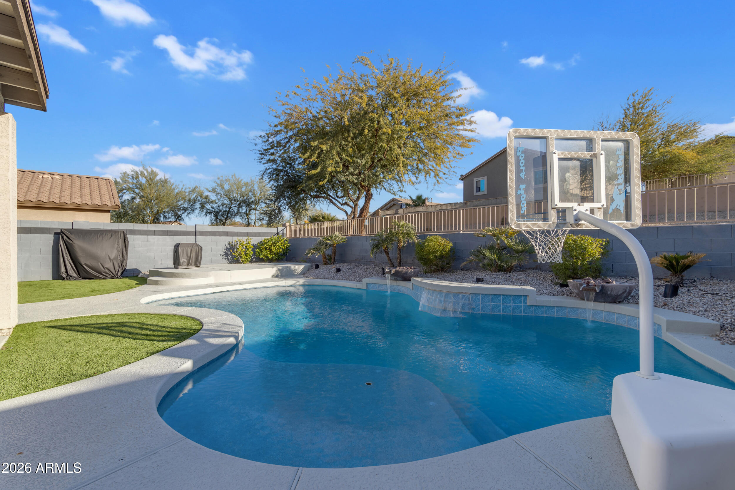 18115 West Cardinal Drive Goodyear, AZ 85338 - Photo 49 of 88 a view of a swimming pool with a patio