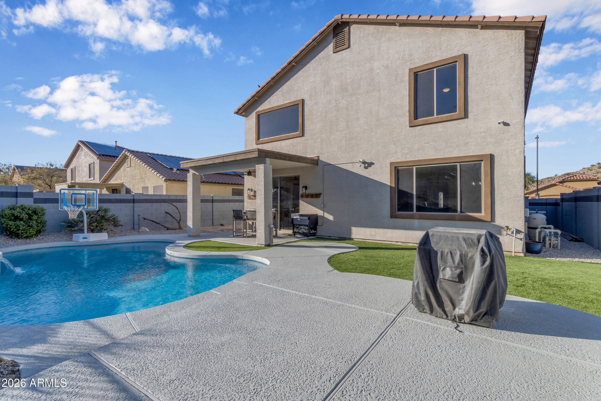 18115 West Cardinal Drive Goodyear, AZ 85338 - Photo 50 of 88 a view of a house with swimming pool