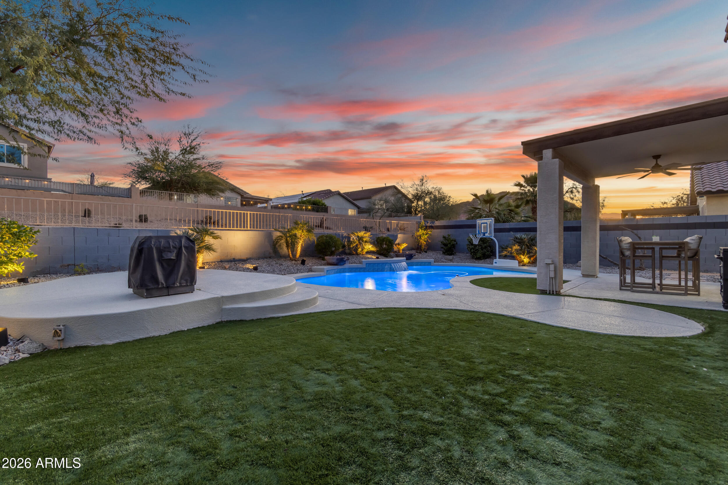 18115 West Cardinal Drive Goodyear, AZ 85338 - Photo 60 of 88 a view of outdoor space yard deck patio and outdoor kitchen