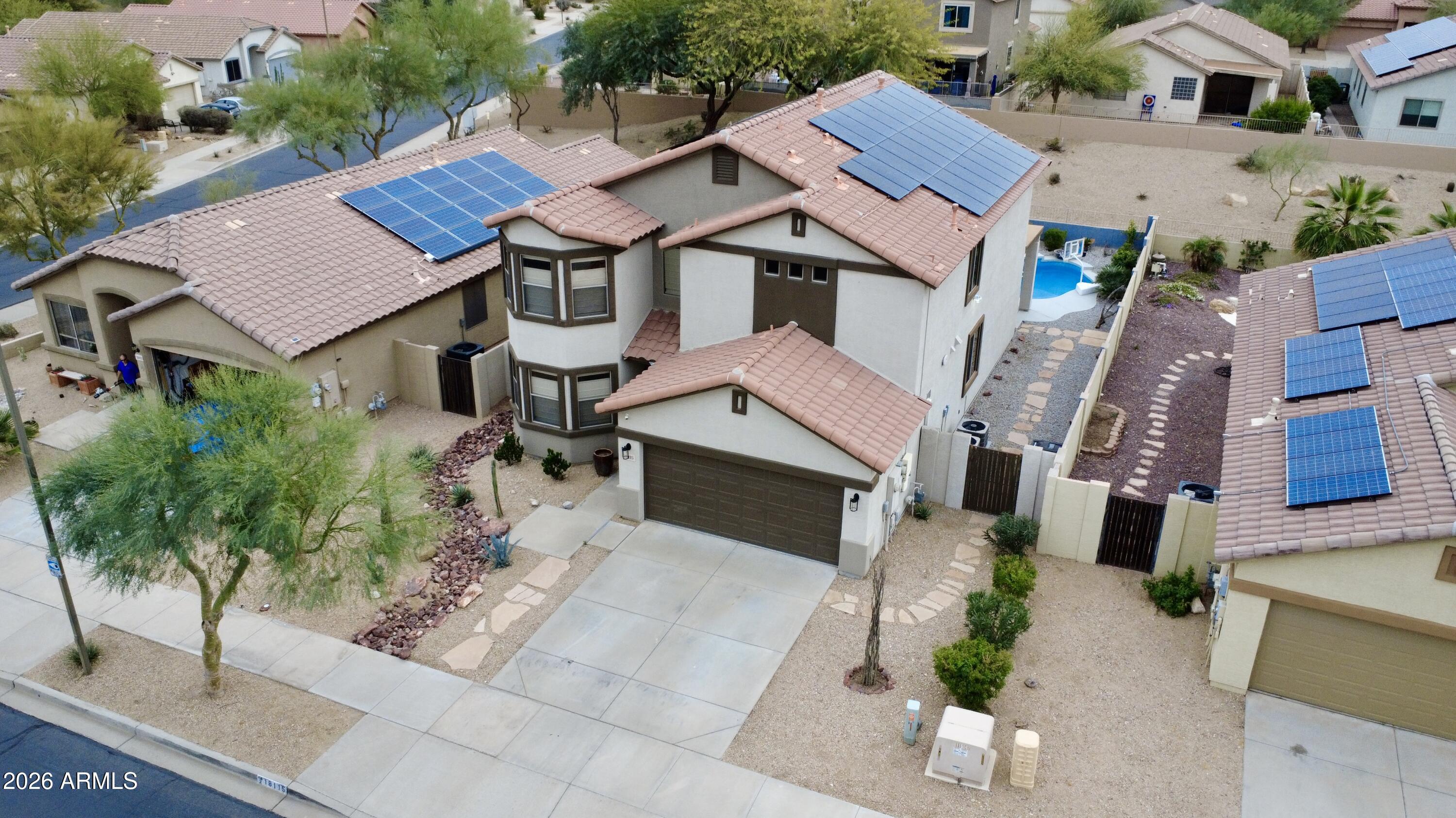 18115 West Cardinal Drive Goodyear, AZ 85338 - Photo 67 of 88 an aerial view of a house with a garden and plants