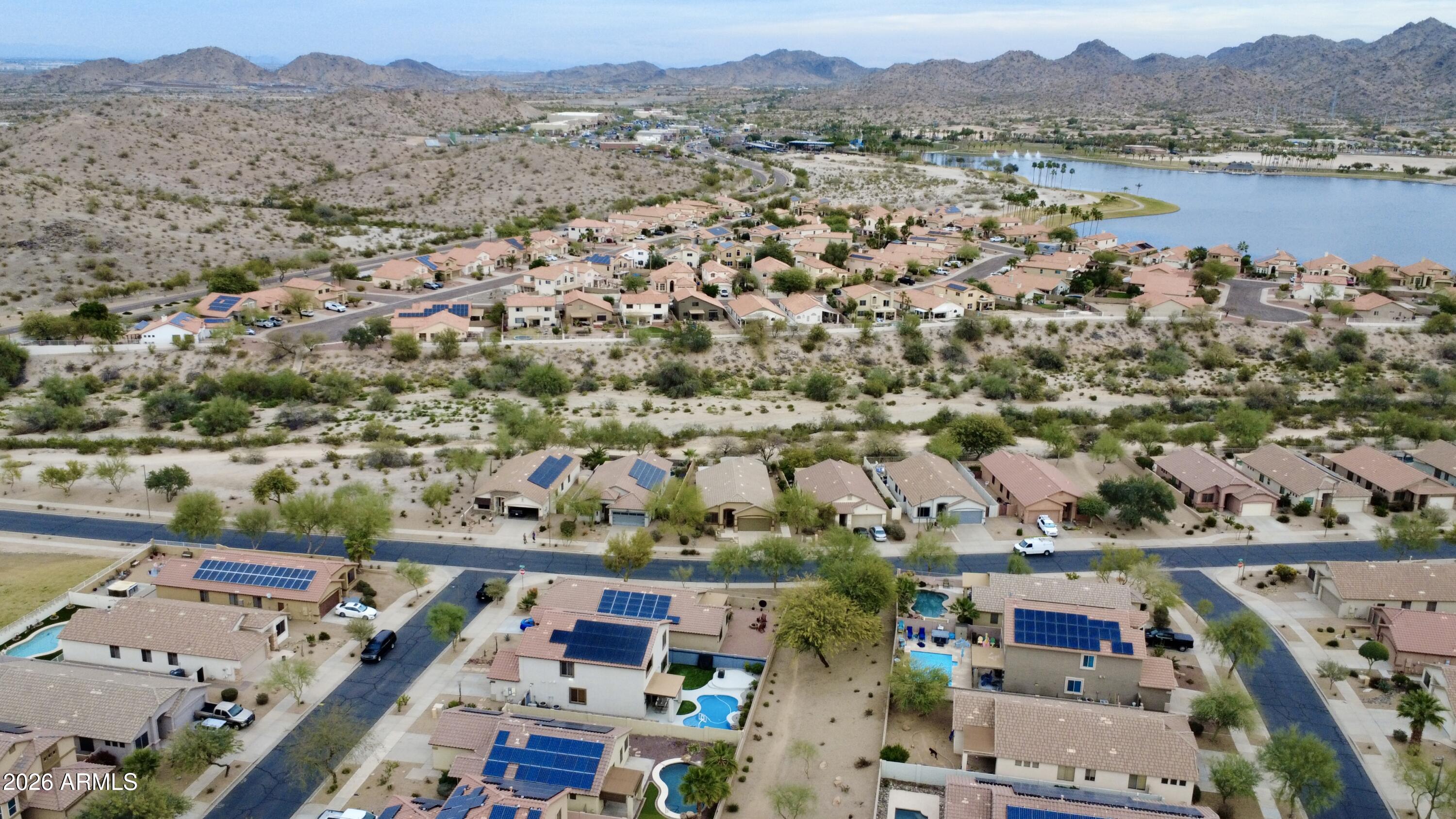 18115 West Cardinal Drive Goodyear, AZ 85338 - Photo 74 of 88 an aerial view of residential building and lake