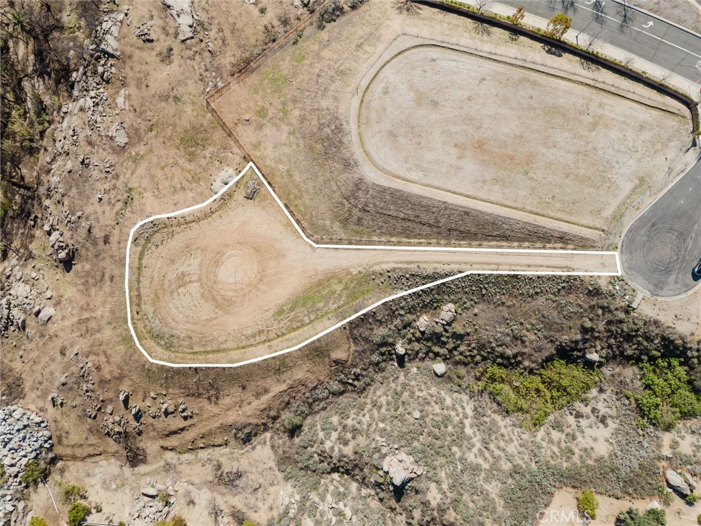 7282 Magnon Court Riverside, CA 92506 - Photo 5 of 15 a bathroom with a granite countertop sink and a mirror