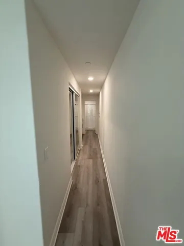 a room with a storage and utility room