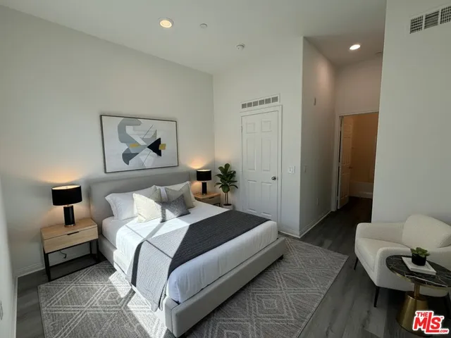 a view of a swimming pool with an outdoor space and seating area