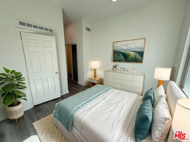a view of a swimming pool with a table and chairs