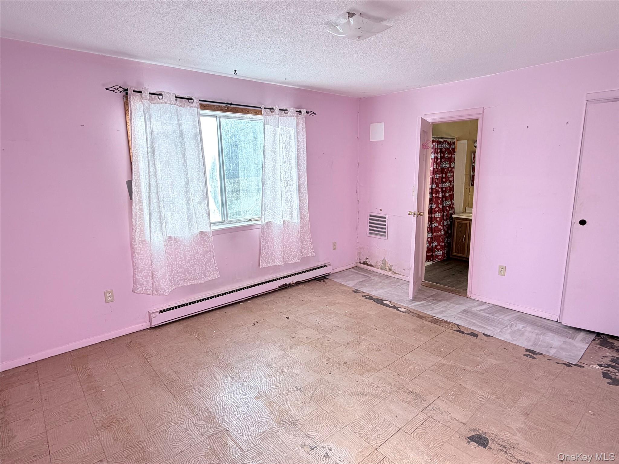 881 Albany Post Road, Unit 21 New Paltz, NY 12561 - Photo 10 of 19 wooden floor and window in a room
