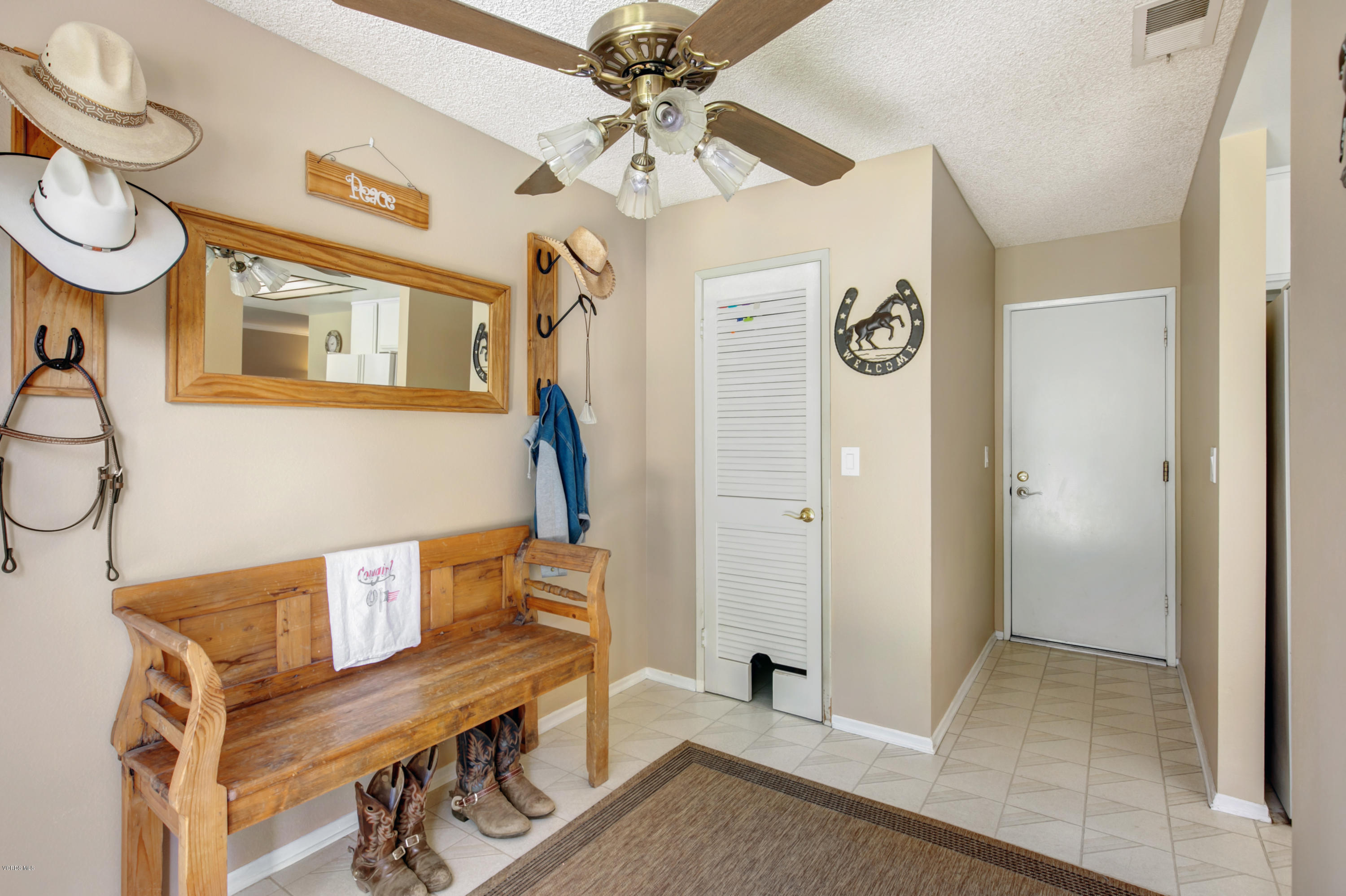 1291 Rambling Road Simi Valley, CA 93065 - Photo 13 of 75 a view of a hallway with furniture and entryway