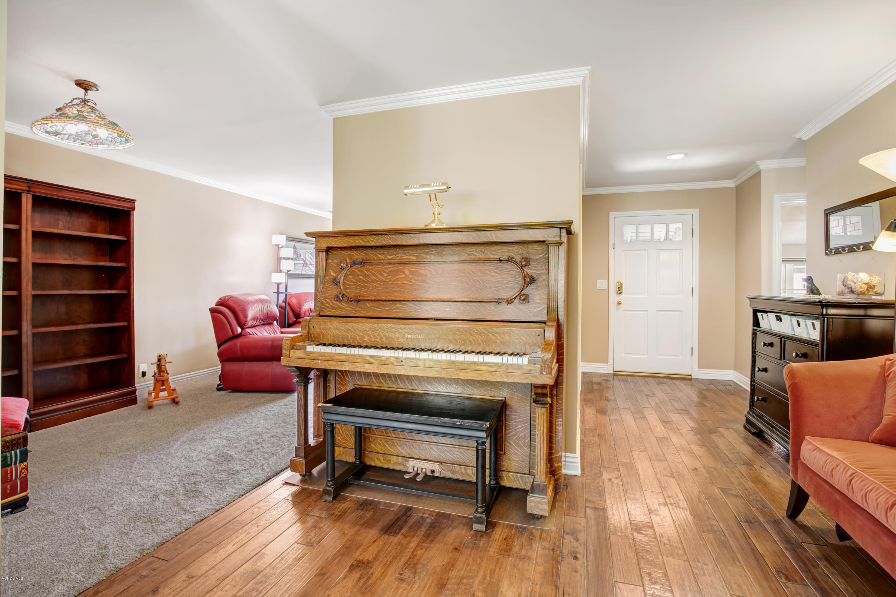 1291 Rambling Road Simi Valley, CA 93065 - Photo 15 of 75 a living room with furniture and a wooden floor