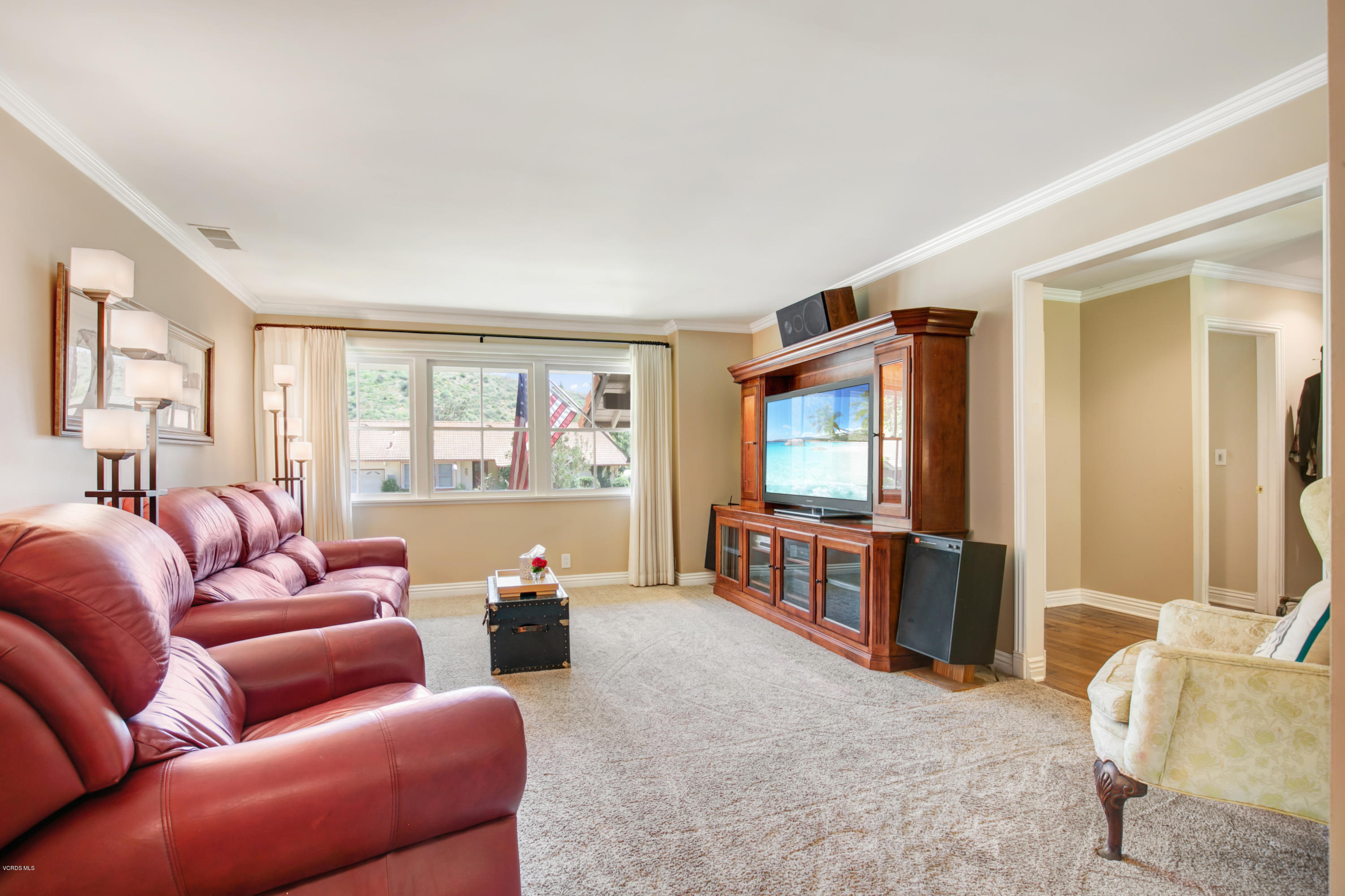 1291 Rambling Road Simi Valley, CA 93065 - Photo 17 of 75 a living room with furniture and a flat screen tv