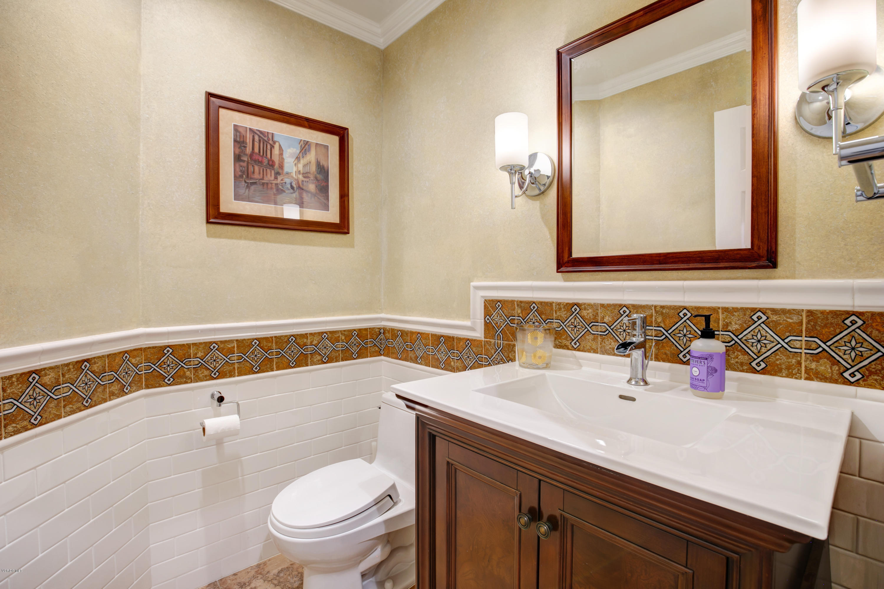 1291 Rambling Road Simi Valley, CA 93065 - Photo 22 of 75 a bathroom with a sink and a mirror
