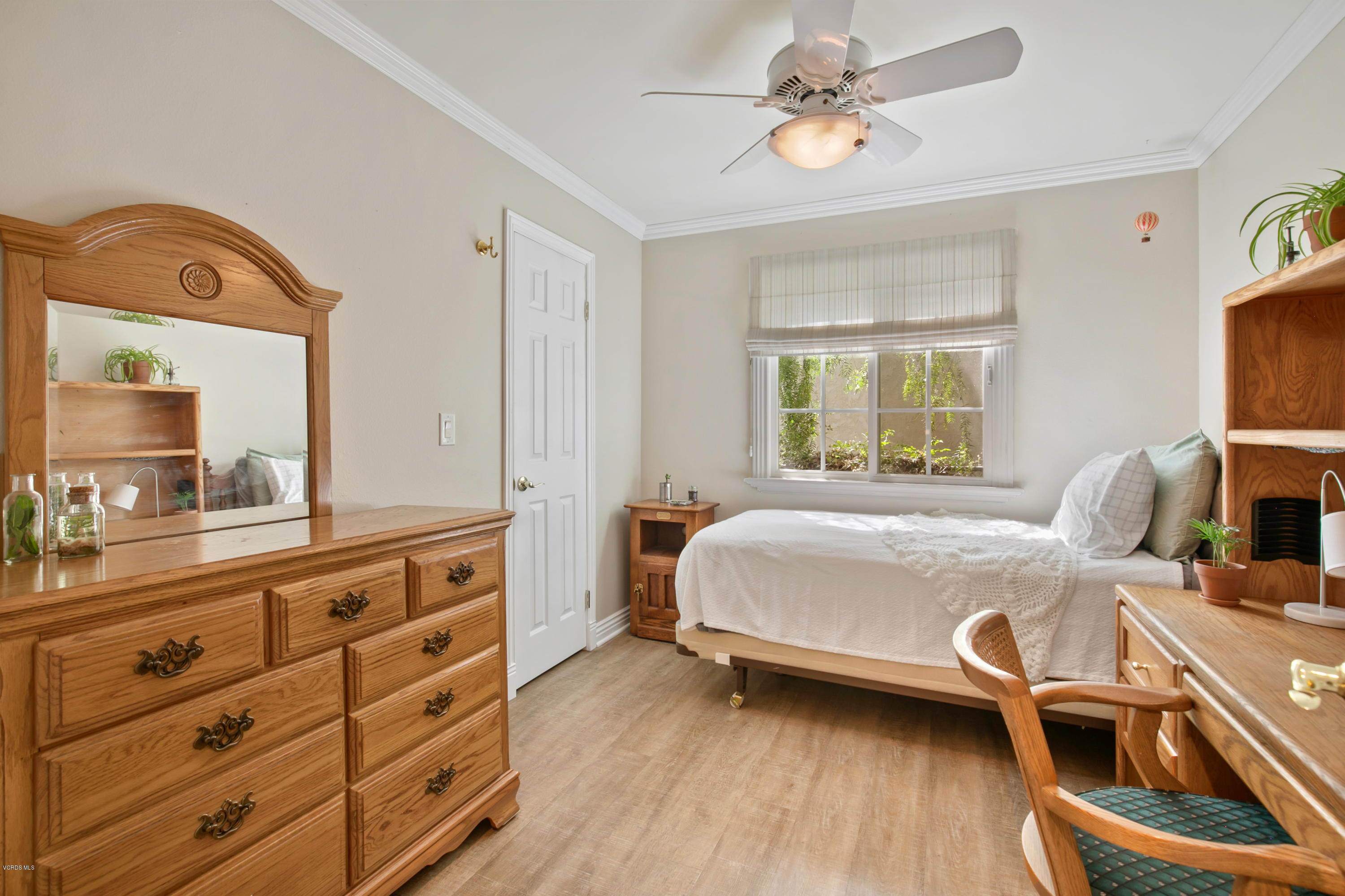 1291 Rambling Road Simi Valley, CA 93065 - Photo 24 of 75 a bed room with a bed and a flat tv screen on dresser