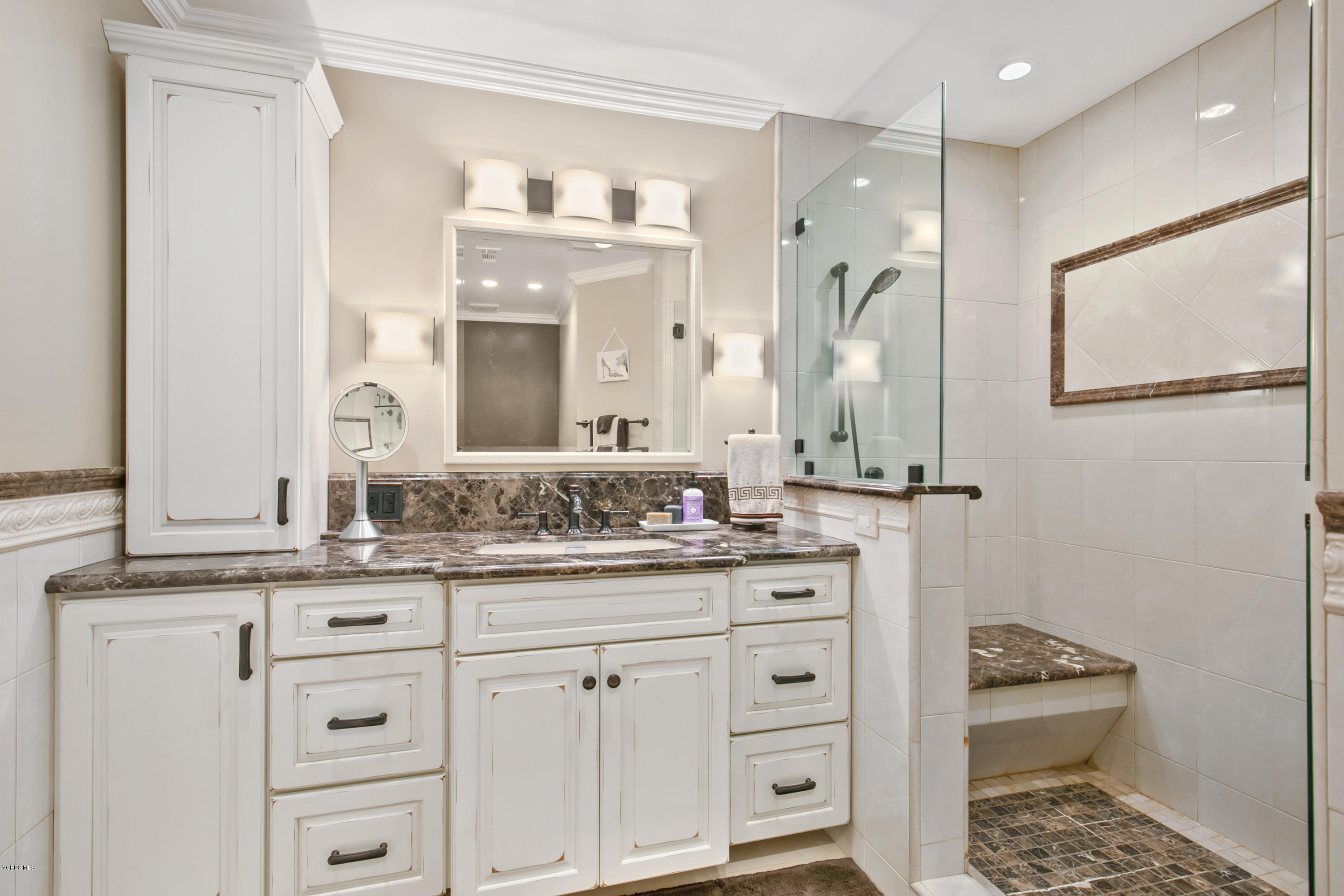 1291 Rambling Road Simi Valley, CA 93065 - Photo 25 of 75 a bathroom with a granite countertop sink mirror and