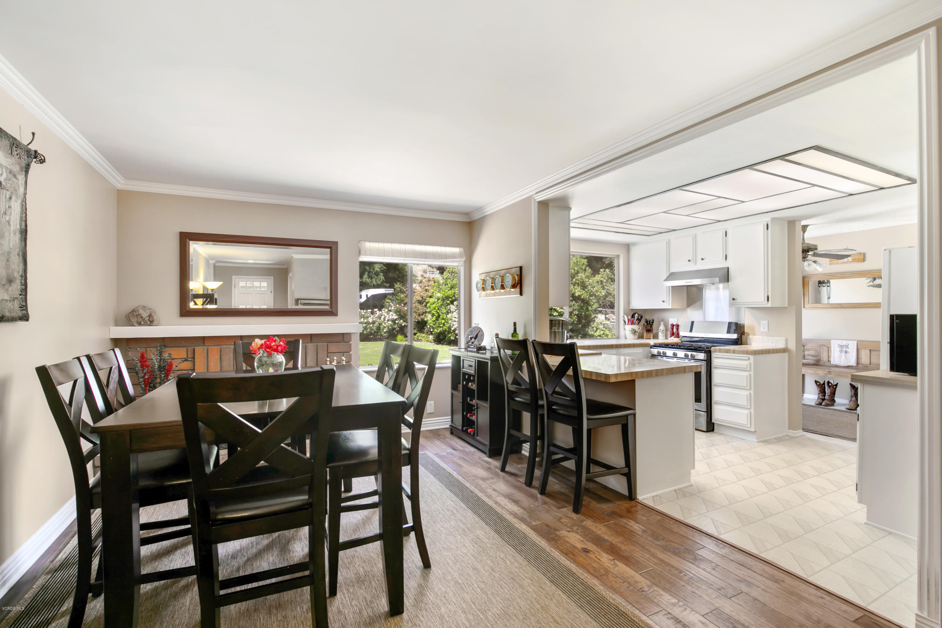 1291 Rambling Road Simi Valley, CA 93065 - Photo 4 of 75 a view of a dining room with furniture and wooden floor