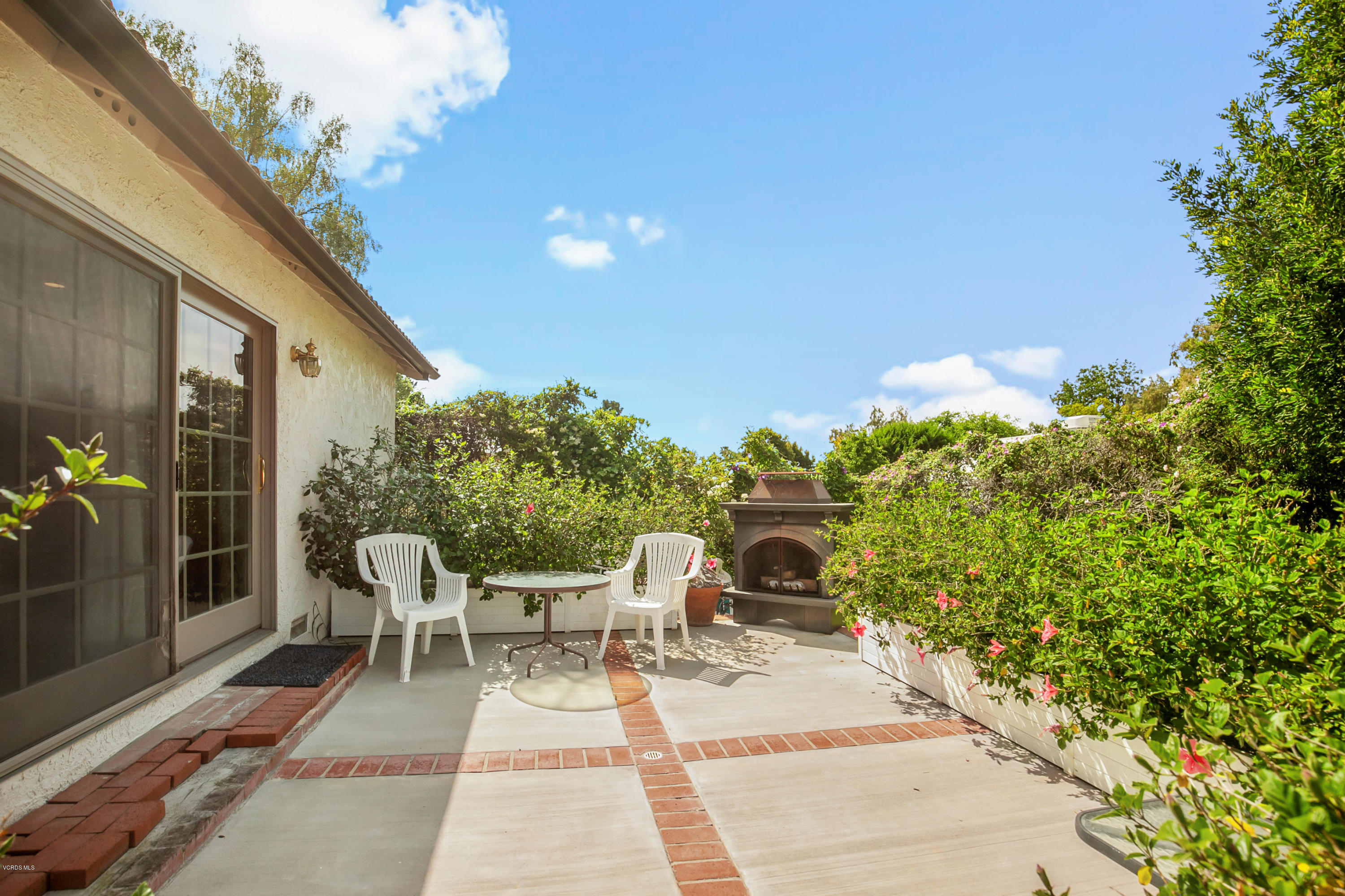 1291 Rambling Road Simi Valley, CA 93065 - Photo 35 of 75 a view of a chairs and table in patio