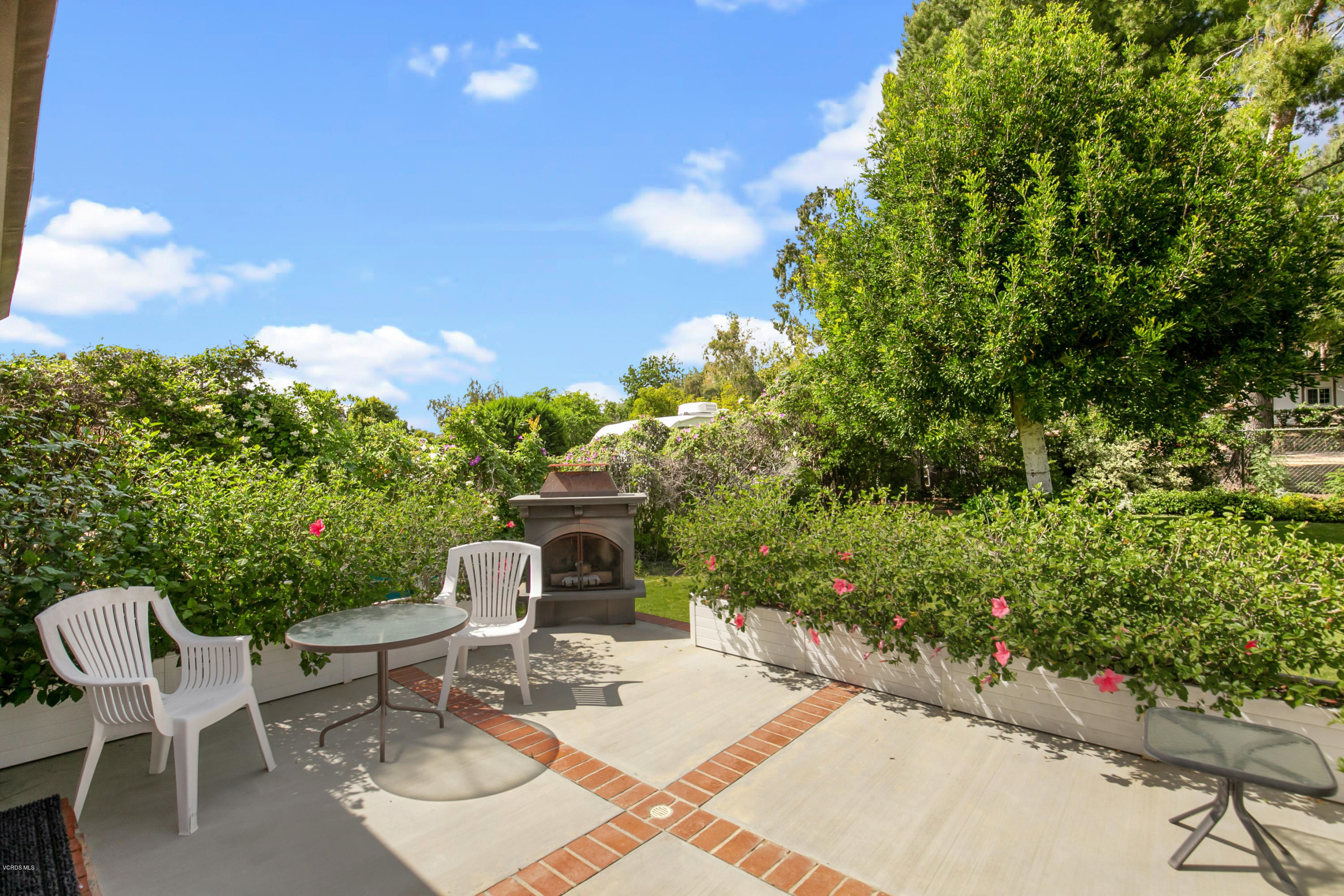 1291 Rambling Road Simi Valley, CA 93065 - Photo 36 of 75 a view of a chairs and table in the patio