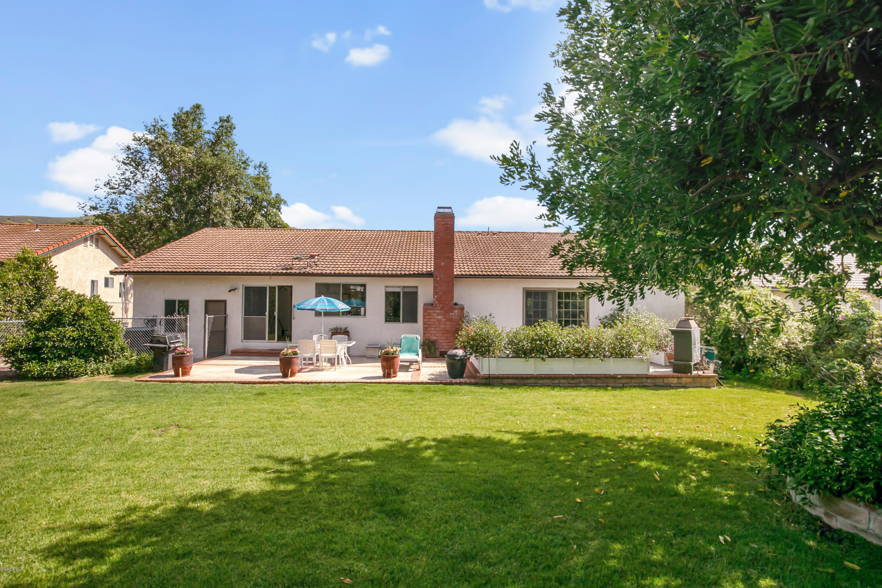1291 Rambling Road Simi Valley, CA 93065 - Photo 39 of 75 a view of a house with a yard porch and sitting area
