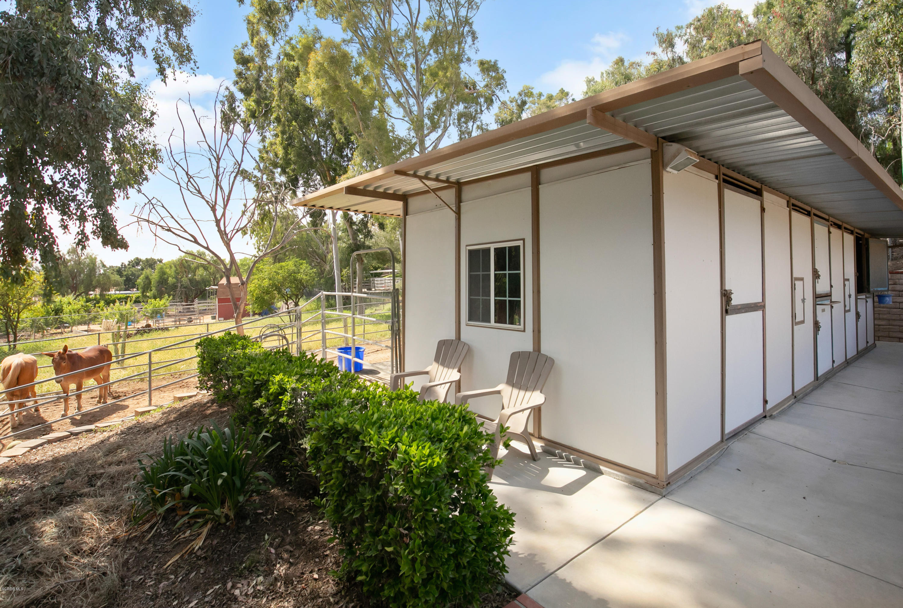 1291 Rambling Road Simi Valley, CA 93065 - Photo 48 of 75 a view of a house with backyard and sitting area