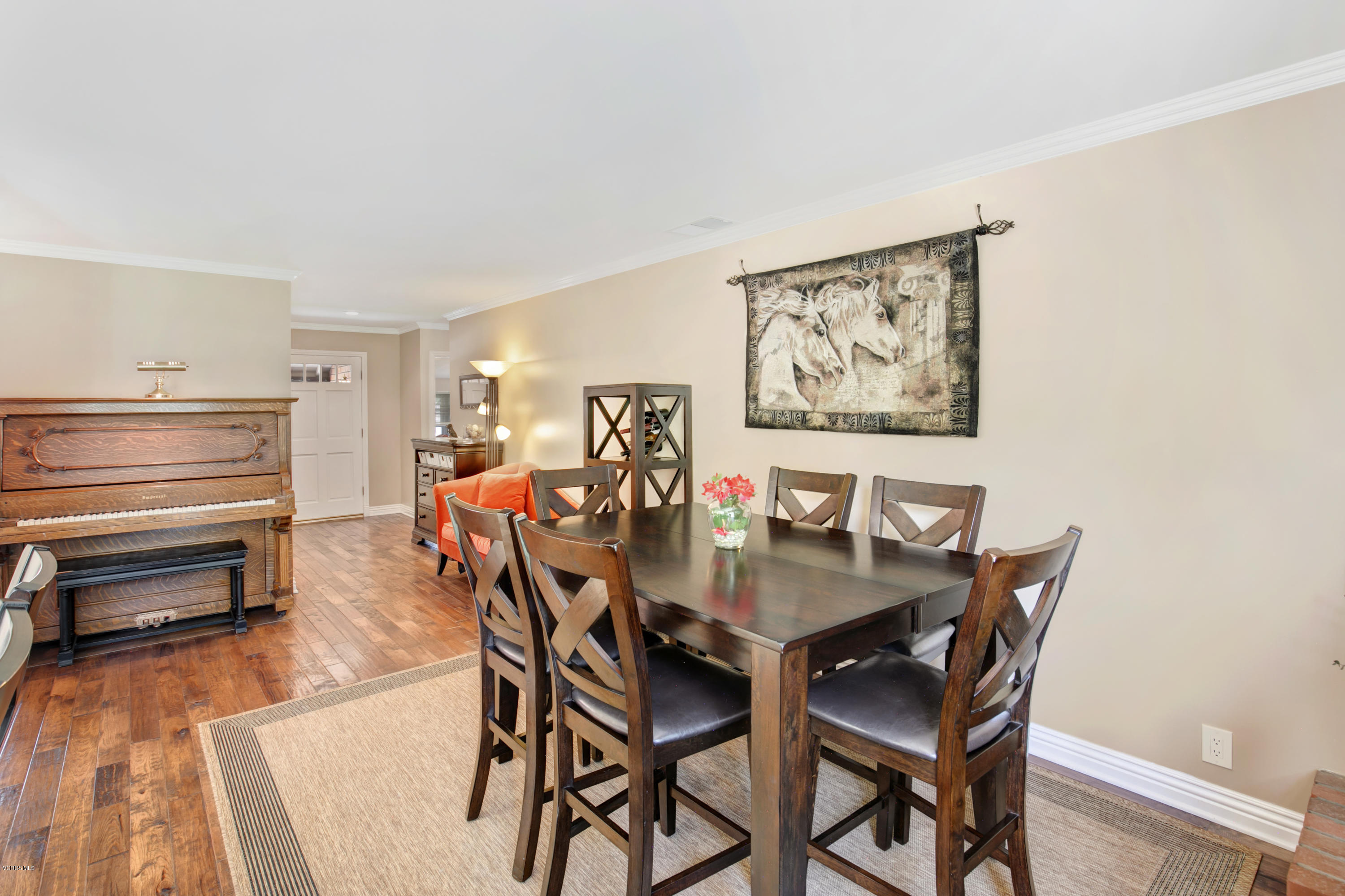 1291 Rambling Road Simi Valley, CA 93065 - Photo 6 of 75 a view of a dining room with furniture and wooden floor
