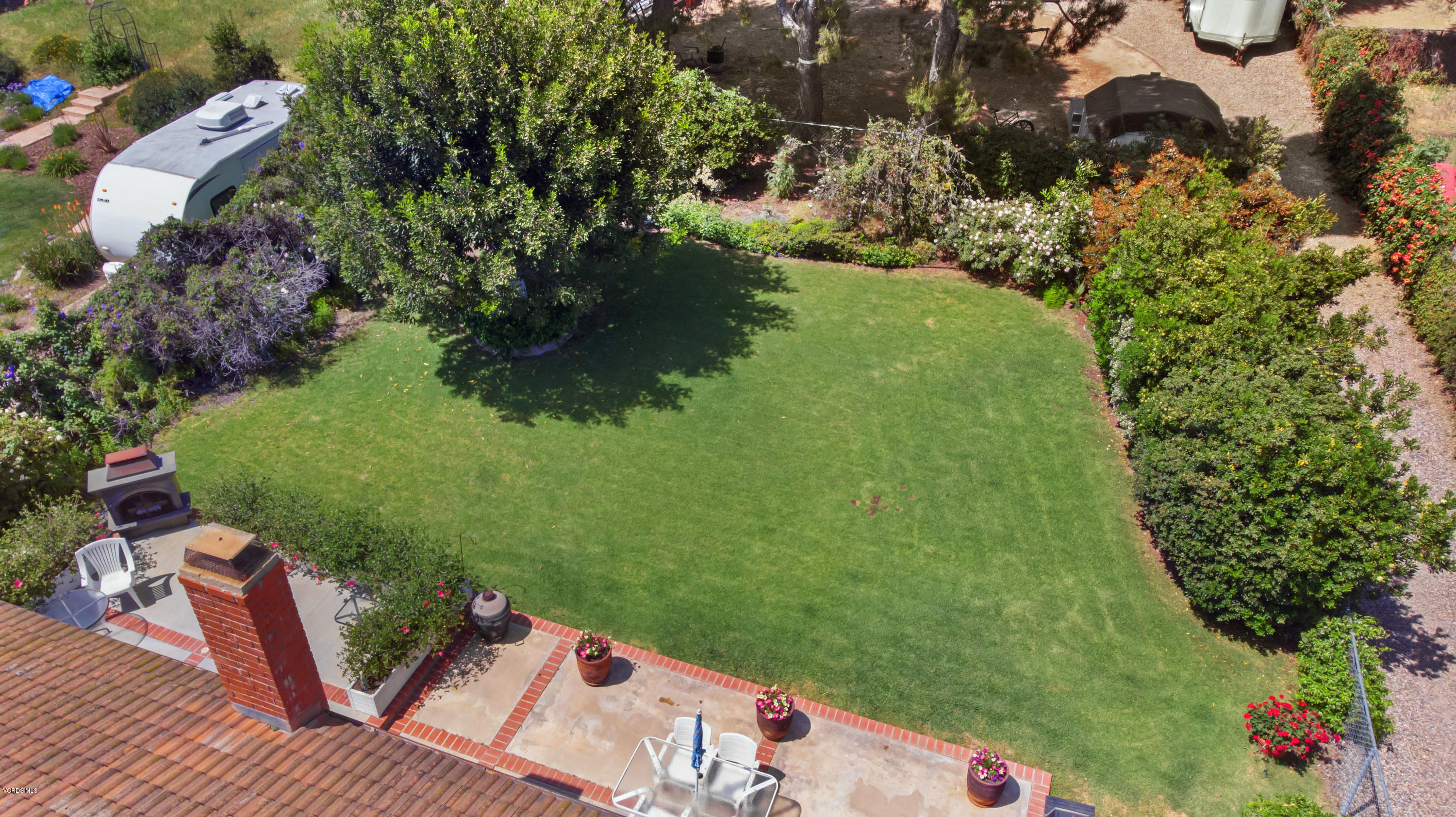 1291 Rambling Road Simi Valley, CA 93065 - Photo 57 of 75 an aerial view of a house having yard