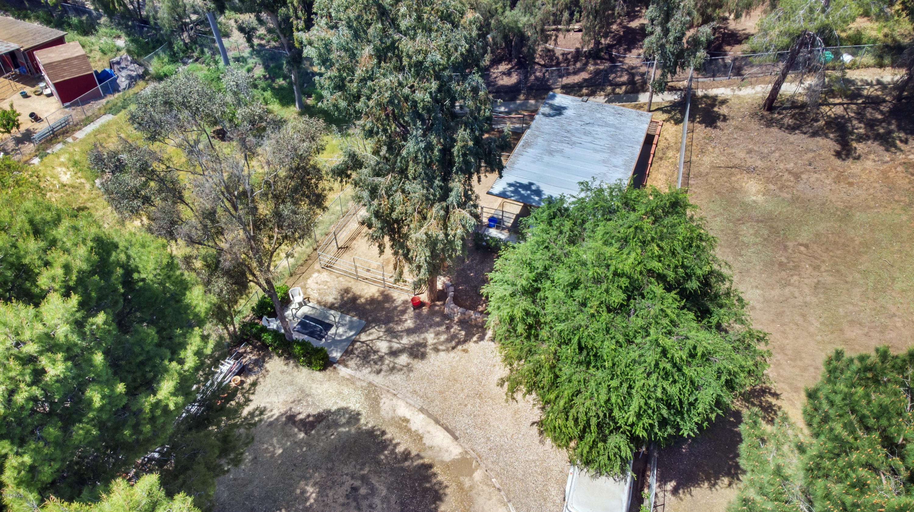 1291 Rambling Road Simi Valley, CA 93065 - Photo 58 of 75 an aerial view of a house with a yard and garden