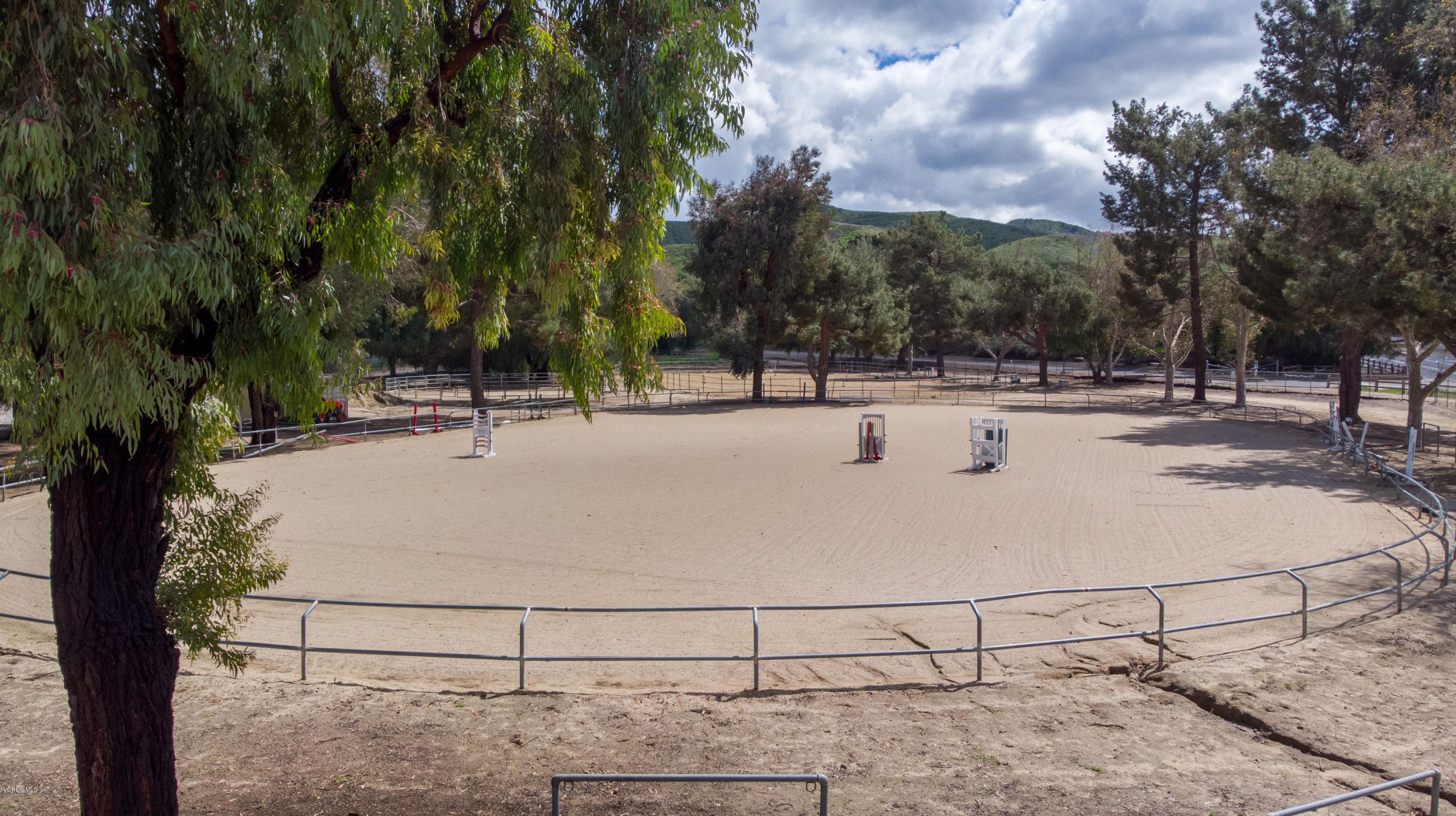 1291 Rambling Road Simi Valley, CA 93065 - Photo 65 of 75 a view of outdoor space with lots of swings and slides