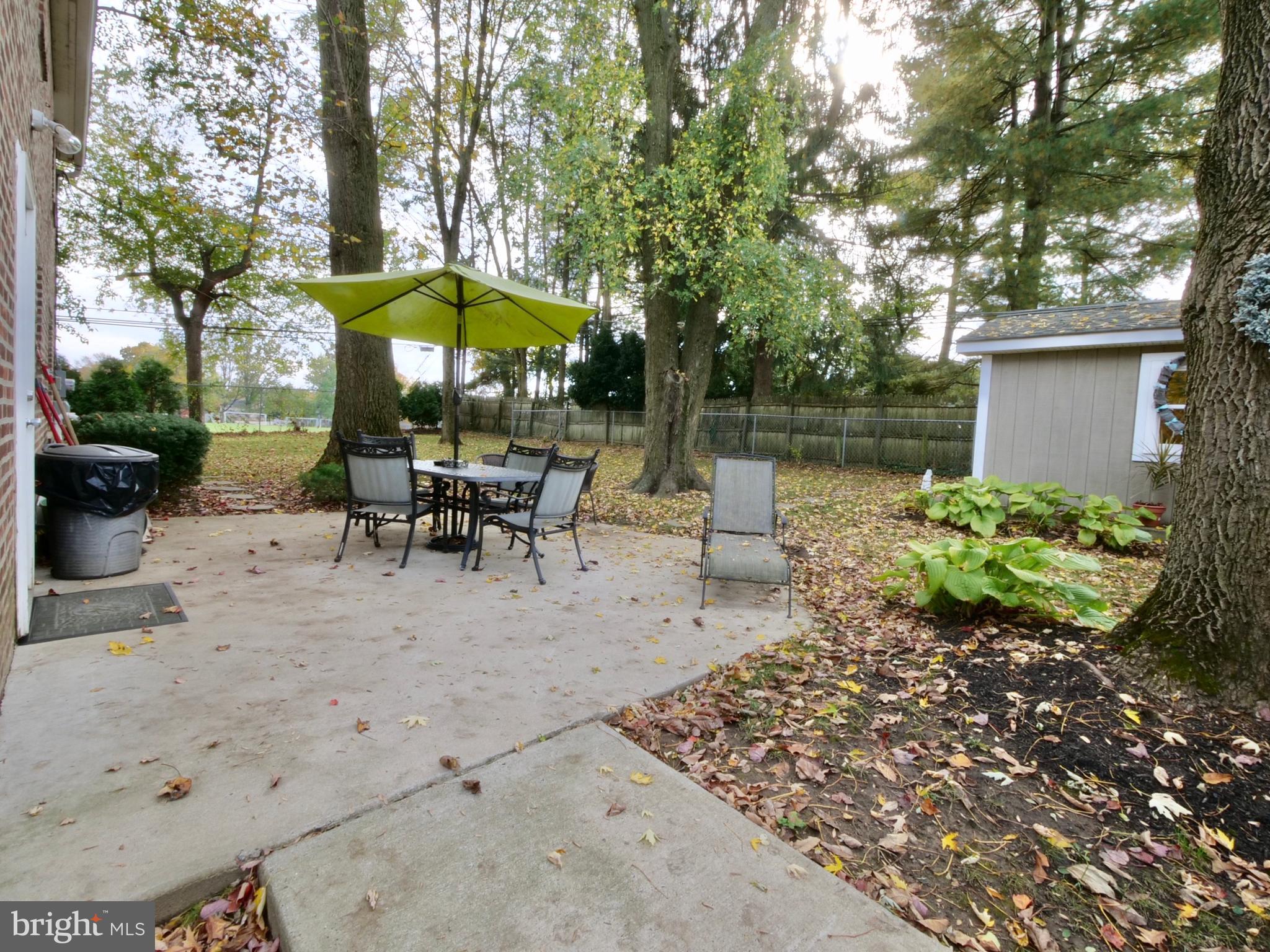 600 West Springfield Road Springfield, PA 19064 - Photo 22 of 28 a garden view with a seating space