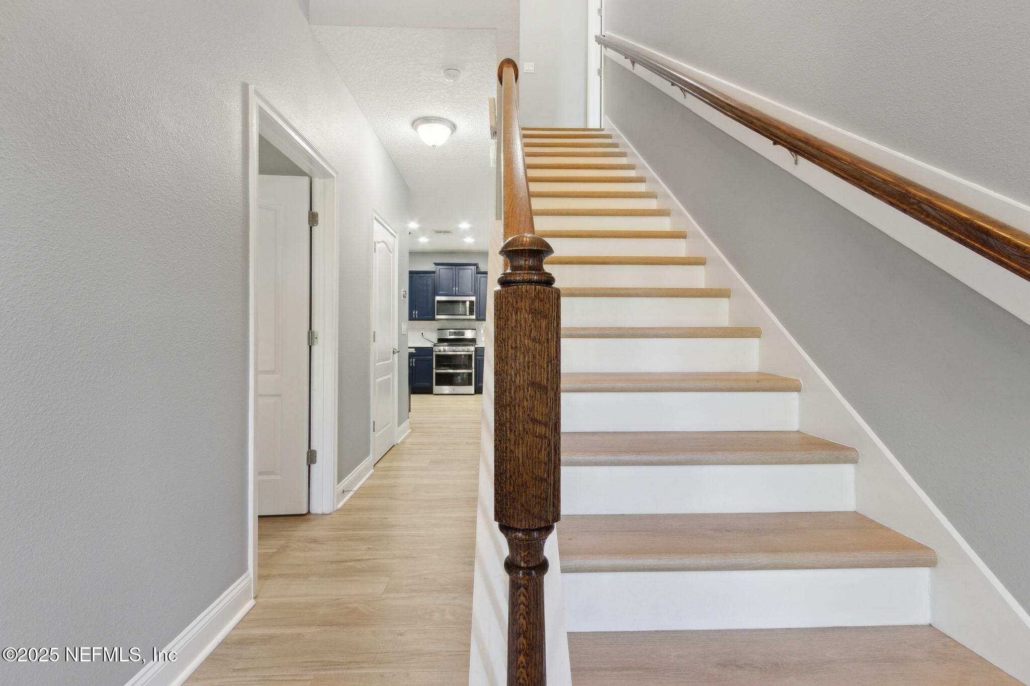 16199 Shellcracker Road Jacksonville, FL 32226 - Photo 17 of 40 a view of entryway and hall with wooden floor