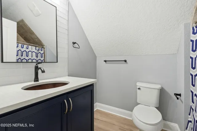 a view of a backyard with a small cabin