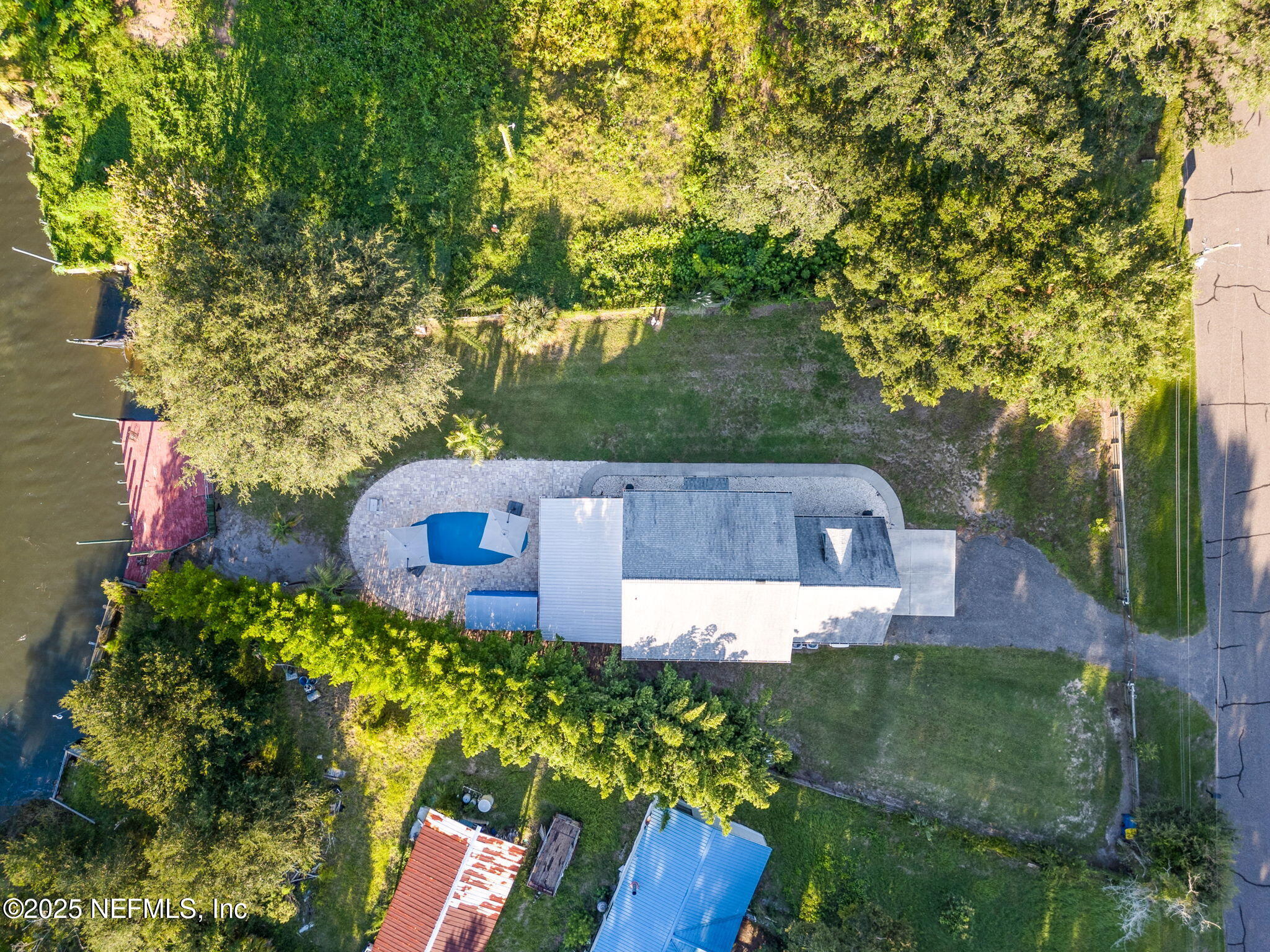 16199 Shellcracker Road Jacksonville, FL 32226 - Photo 37 of 40 an aerial view of a house with a yard