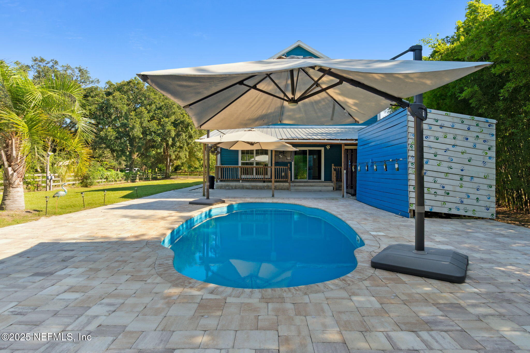 16199 Shellcracker Road Jacksonville, FL 32226 - Photo 4 of 40 a view of a house with backyard and sitting area