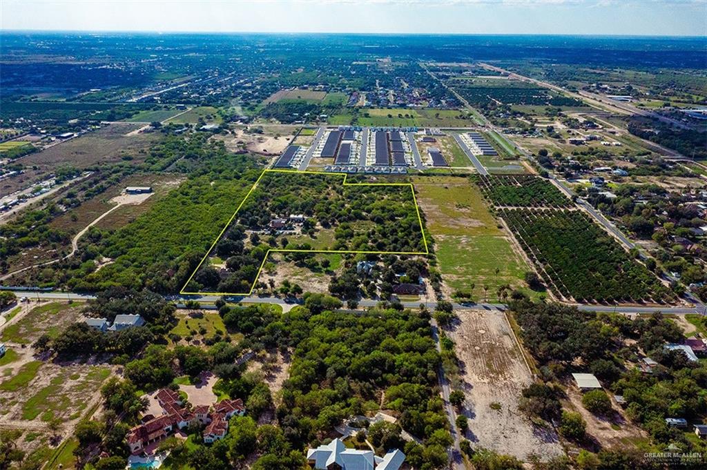 6807 North Taylor Road Mission, TX 78573 - Photo 5 of 6 an aerial view of residential houses with outdoor space